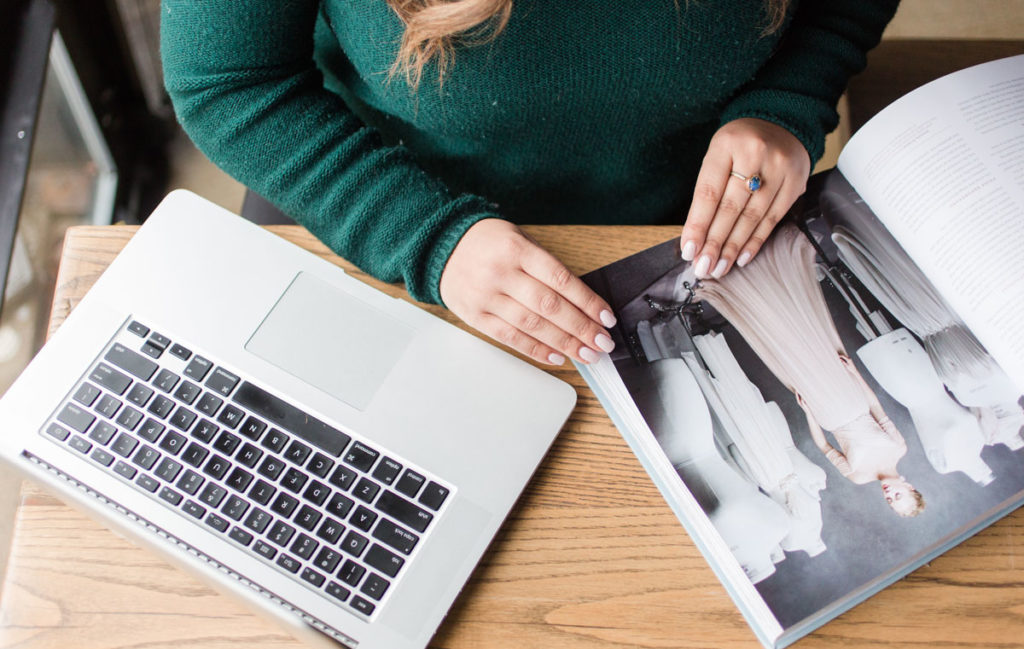 SEO specialist looking at wedding magazine